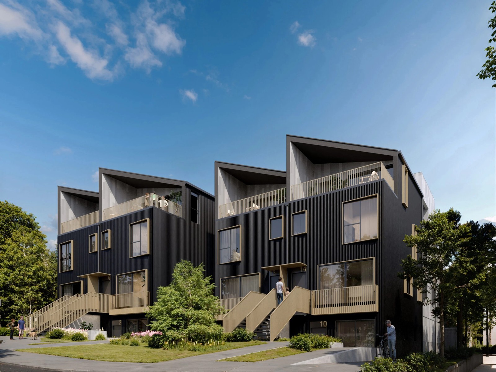North Vancouver black modern townhomes with wood staircases and rooftop patios